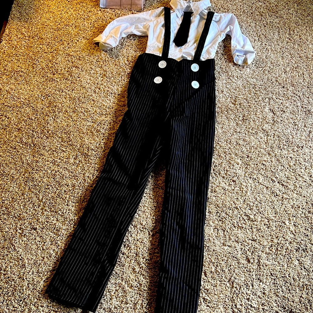 Halloween costume has been worn once, black and white color